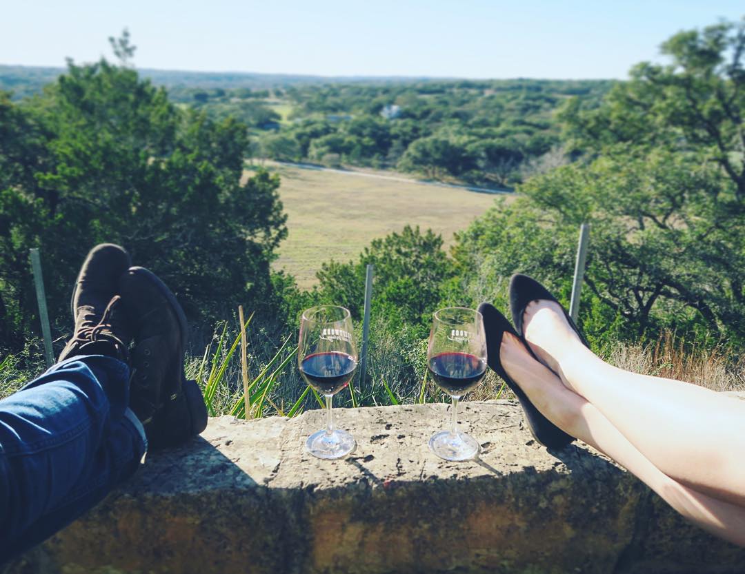 allison and eric drinking wine